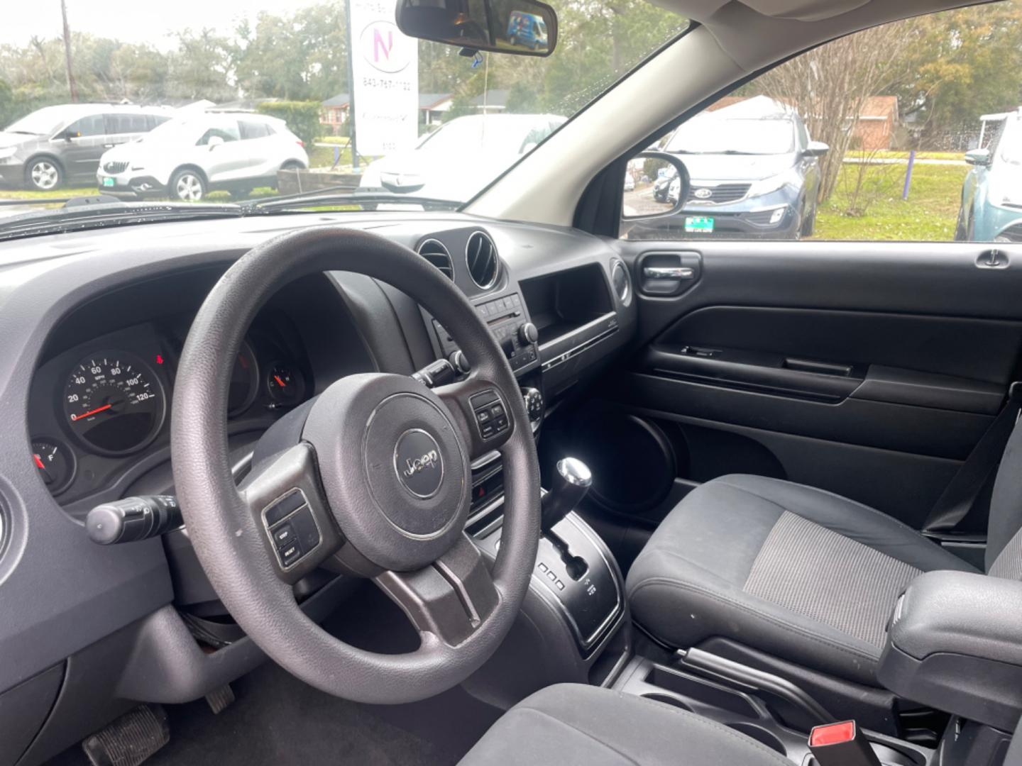 2012 SILVER JEEP COMPASS SPORT (1C4NJCBA8CD) with an 2.0L engine, Continuously Variable transmission, located at 5103 Dorchester Rd., Charleston, SC, 29418-5607, (843) 767-1122, 36.245171, -115.228050 - Spacious Interior with CD/AUX/AM/FM, Hands-free Phone, Power Windows, Power Locks, Power Windows, Power Mirrors, Keyless Entry, Alloy Wheels. Local Trade-in!! 108k miles Located at New Life Auto Sales! 2023 WINNER for Post & Courier's Charleston's Choice Pre-owned Car Dealer AND 2018-2024 Top 5 Fin - Photo#19